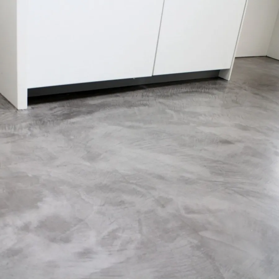 Professional micro cement flooring application by FAIRBUILD in Dubai interior space